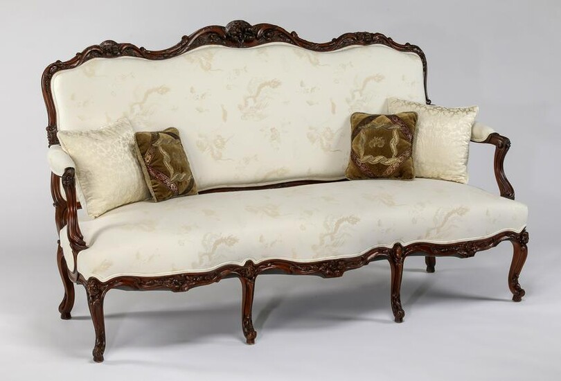 French Provincial style carved settee in damask