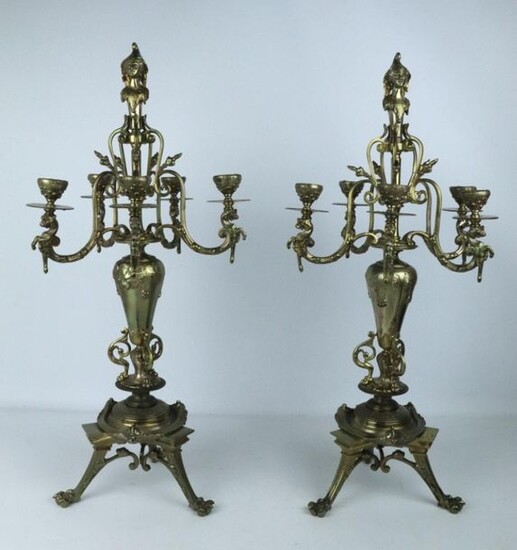Large pair of bronze and brass five-light candelabra.