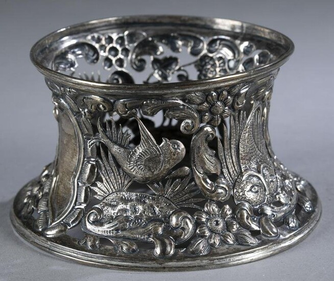 Late Victorian sterling repousse pierced stand.