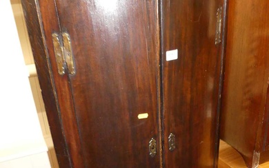 Lot details A George III mahogany bowfront double door hanging...