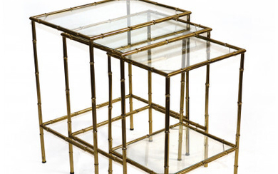 Lotto composto da tre tavolini a nido con struttura a finto bamboo in acciaio dorato, ripiani in vetro. Italia, anni...