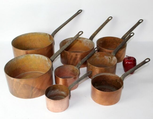 Nest of 8 French copper pots