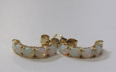 OPAL EARRINGS, pair of 5 stone opal earrings set in 18ct yel...