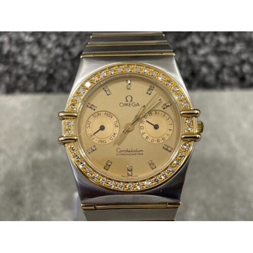 Omega gents Bi-metal Constellation watch. Gold with champagn...