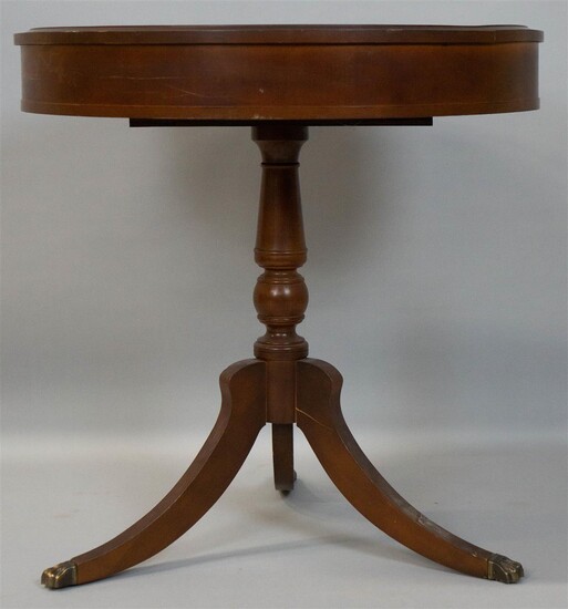 REGENCY STYLE MAHOGANY AND LEATHER INSET DRUM TABLE