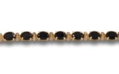 RIVIERE BRACELET WITH SAPPHIRES AND DIAMONDS, IN YELLOW GOLD
