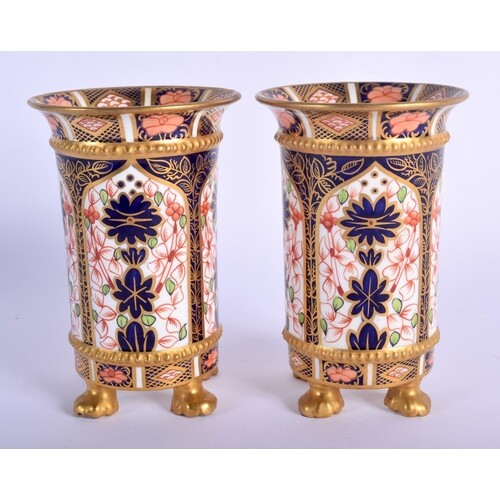 Royal Crown Derby pair of four footed spill vases painted in...