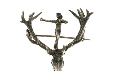 Silver brooch with antlers
