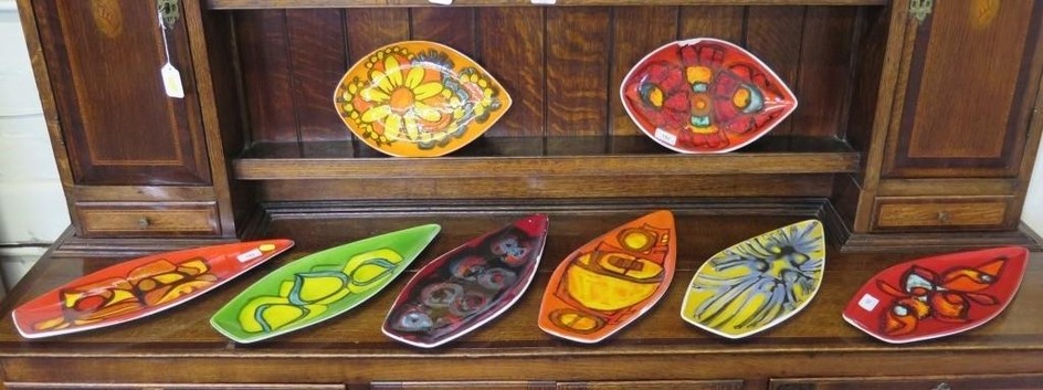 Six Poole Pottery Delphis boat shaped dishes, 44cm long, fou...