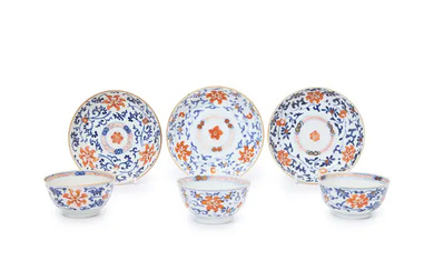 Three sets of Chinese iron red and blue and white tea bowls...
