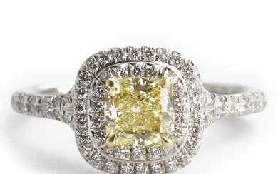 Tiffany & Co.: A diamond ring “Soleste” set with a cushion-cut natural fancy yellow diamond weighing app. 0.80 ct., mounted in platinum and 18k gold. Size 52.