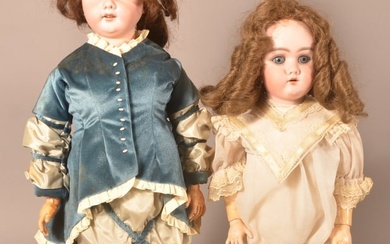 Two Antique German Bisque Head Girl Dolls.