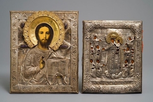 Two Russian silvered copper oklad or riza icons: '…