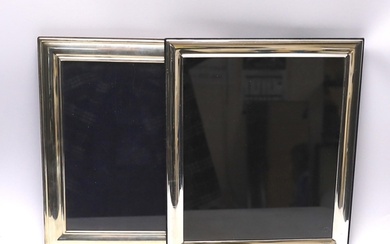 Two large modern silver mounted rectangular photograph frame...