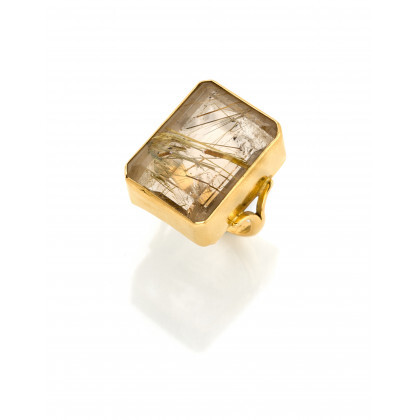 Yellow gold octagonal rutile quartz ring, g 13.53 circa size 14/54. Marked 786 FI. (defects)
