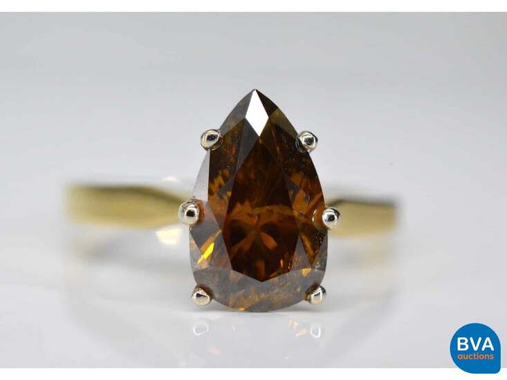 Yellow gold ring with fancy cognac colored diamond.