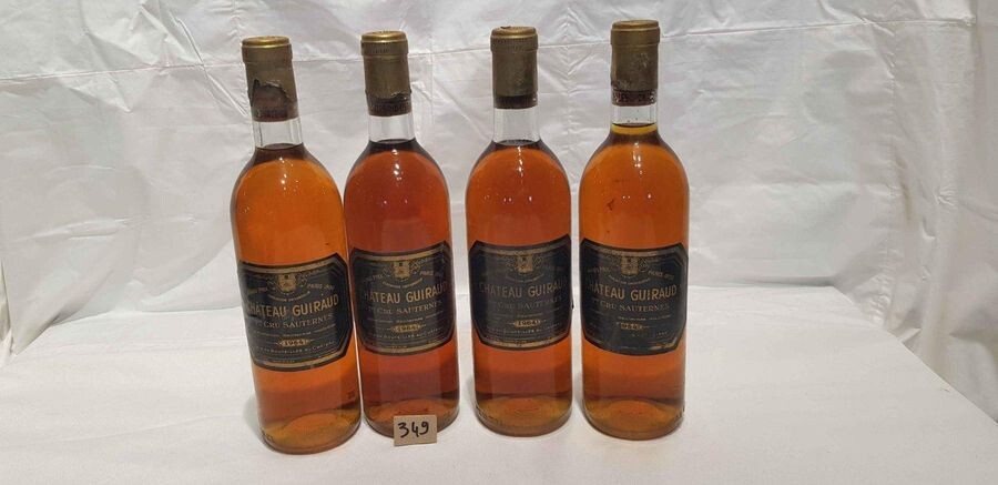 4 bottles Château GUIRAUD 1964 SAUTERNES, perfect labels and levels. 2 damaged capsules.