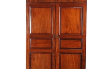 A mahogany wardrobe or linen cupboard, late 19th /early 20th century
