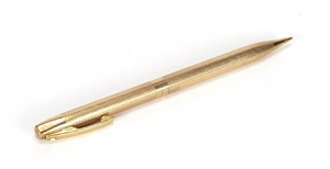 9ct gold Sheaffer propelling pencil with engine turned body,...