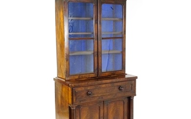 A 19thC mahogany secretaire bookcase with a moulded top abov...