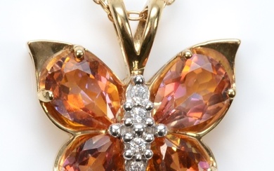 A 9ct gold mystic topaz and cubic zirconia butterfly pendant...