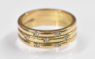 A 9ct yellow gold cubic zirconia ring, set with seven...