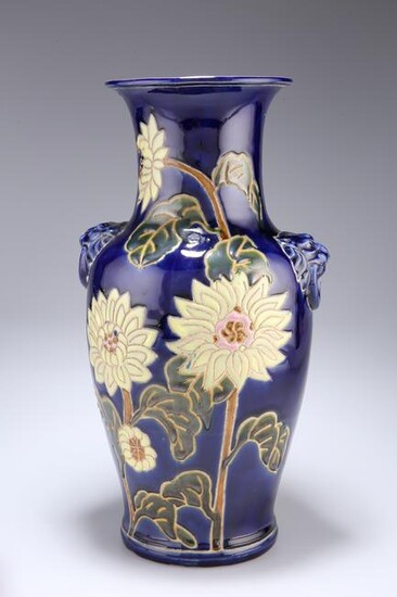 A BLUE-GLAZED POTTERY VASE, of baluster form with