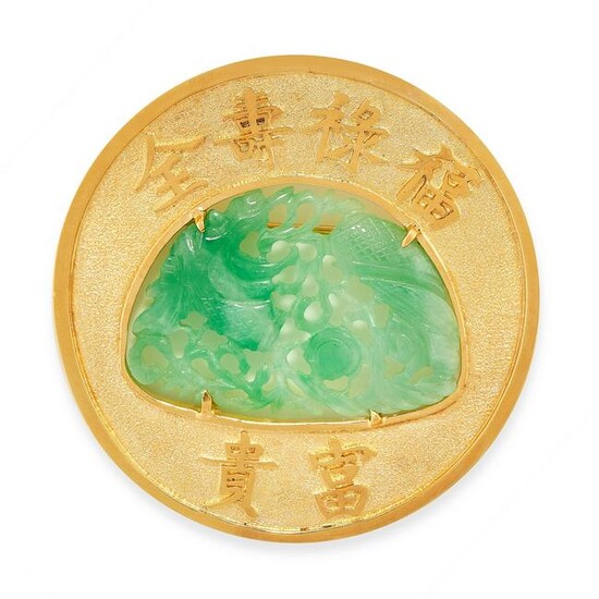 A CHINESE CARVED JADEITE BROOCH in high carat yellow