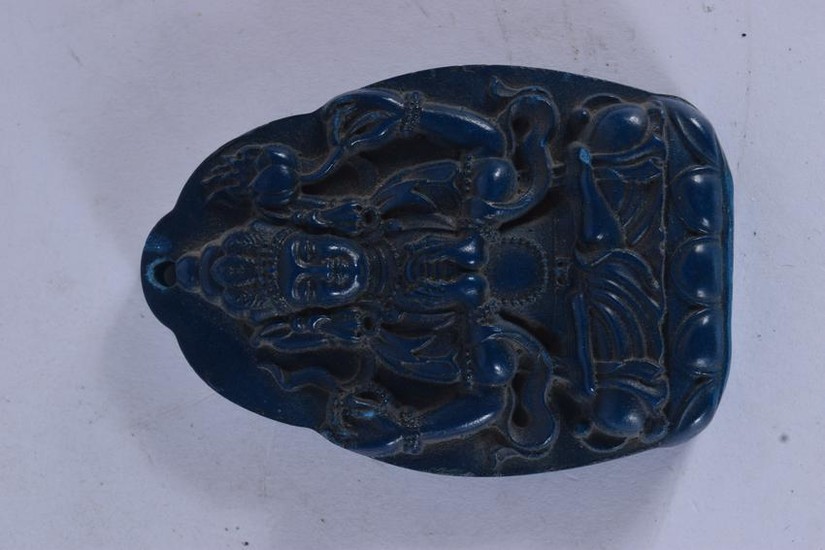 A CHINESE CARVED LAPIS LAZULI TYPE CARVED PENDANT