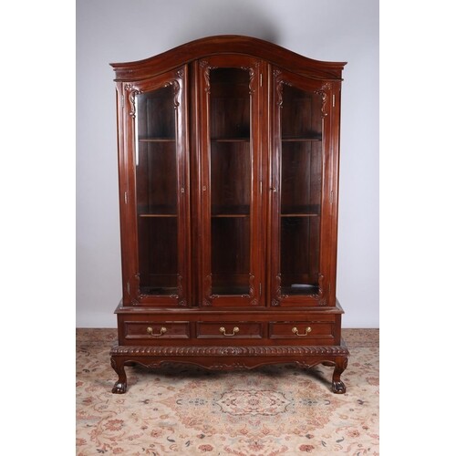 A CHIPPENDALE DESIGN MAHOGANY CHINA DISPLAY CABINET the arch...