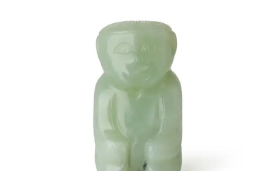 A Chinese archaistic jade figure of a monkey 20th century Carved as...
