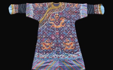 A Chinese embroidered blue silk "Nine-Dragon robe, Qing dynasty, circa 1900 海水江