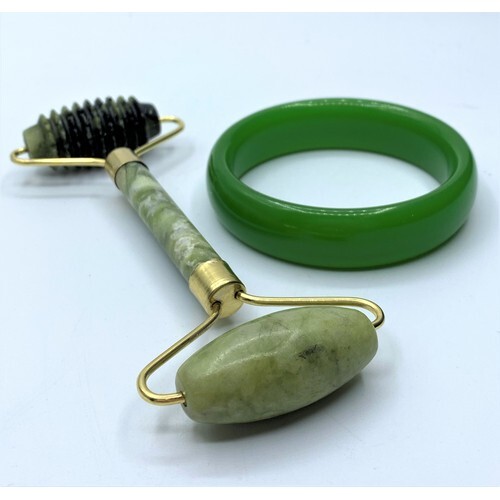 A Chinese green jade bangle in original box and a Chinese ja...