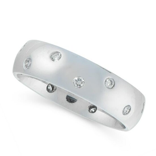 A DIAMOND BAND DRESS RING in 18ct white gold, set all