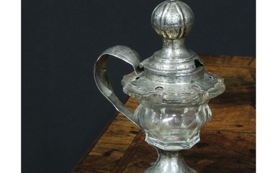 A Dutch silver and clear glass mustard, hinged cover, scroll...