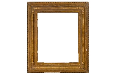 A FRENCH 19TH CENTURY GILDED COMPOSITION EMPIRE FRAME