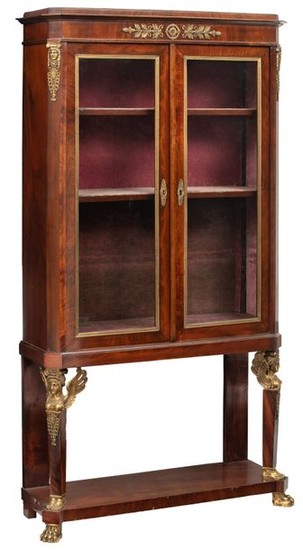 A French Empire style mahogany display cabinet with...