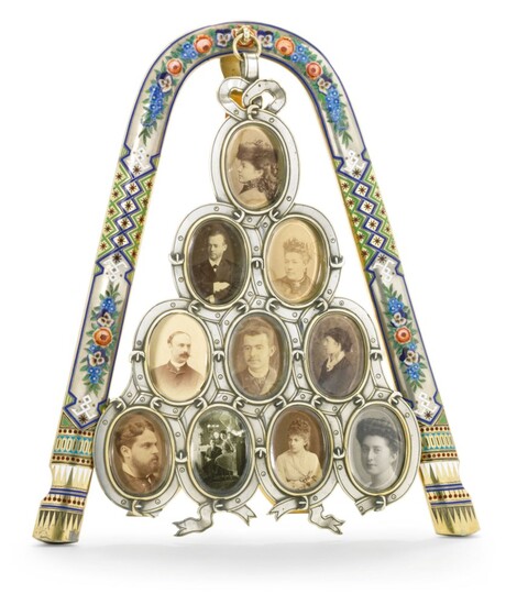 A LARGE CHAMPLEVÉ AND EN PLEIN ENAMEL PARCEL-GILT SILVER PHOTOGRAPH FRAME SHAPED AS A HORSE YOKE, MARKED SAZIKOV WITH IMPERIAL WARRANT, ST PETERSBURG, 1880