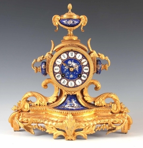 A LATE 19TH CENTURY FRENCH ORMOLU AND PORCELAIN PANELED MANT...