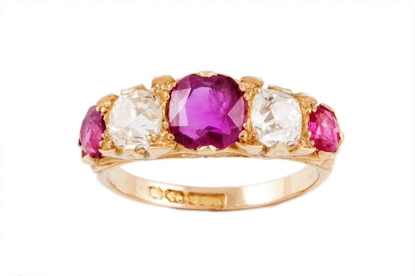 A LATE VICTORIAN RUBY AND DIAMOND CARVED HEAD RING, with Bur...