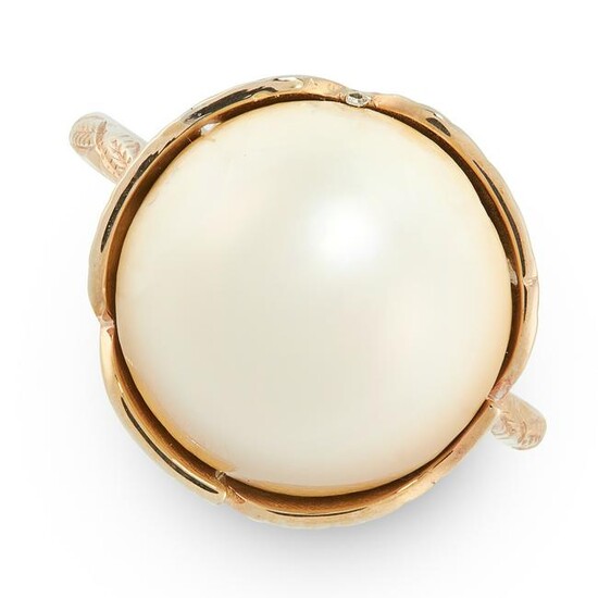 A NATURAL PEARL DRESS RING in yellow gold, set with a