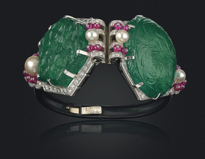 A PAIR OF ART DECO EMERALD, NATURAL PEARL, RUBY AND DIAMOND CLIPS, CARTIER