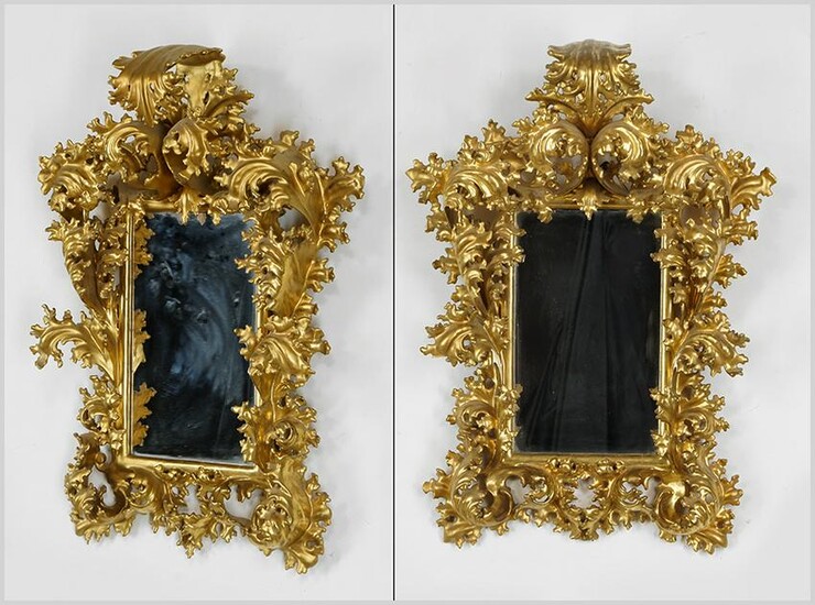 A Pair of Baroque Style Gilt Wood Mirrors.