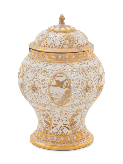 A Royal Worcester Parcel Gilt Reticulated Porcelain Vase and Cover