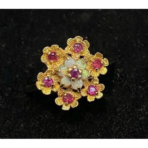 A UNIQUE 9CT GOLD OPAL CLUSTER DAISY RING, with six claw set...