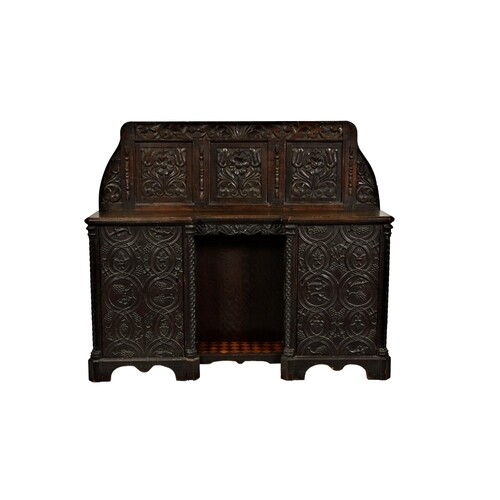 A Victorian carved oak side cabinet, made using some earlier...