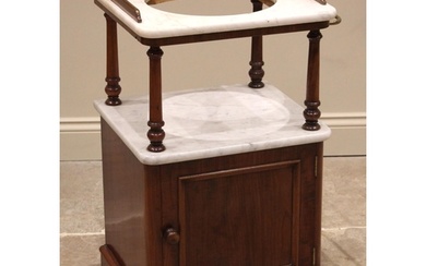 A Victorian mahogany and marble wash stand, the white marble...