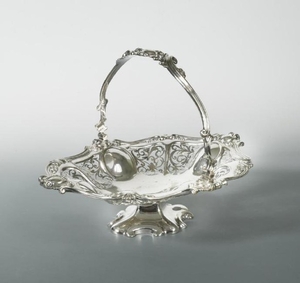 A Victorian silver plated swing handled bread basket