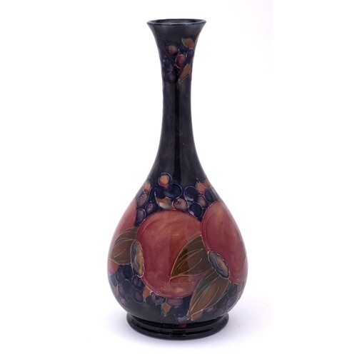 A William Moorcroft bottle vase: with slender waisted neck a...