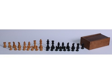 A boxwood and ebony Staunton pattern weighted chess set, the...